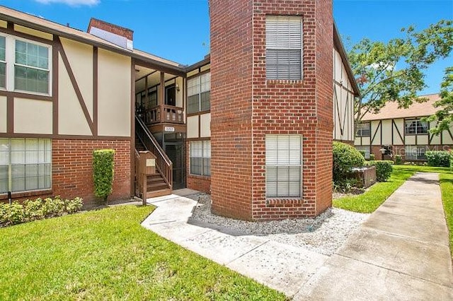 exterior space with a lawn