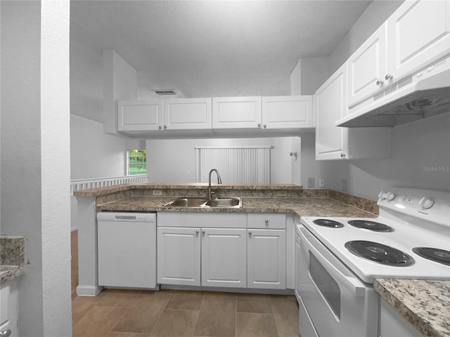 kitchen featuring sink, white appliances, white cabinets, and light tile patterned floors