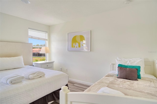 bedroom featuring hardwood / wood-style flooring