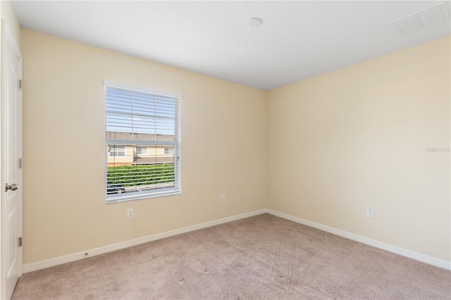 view of carpeted spare room