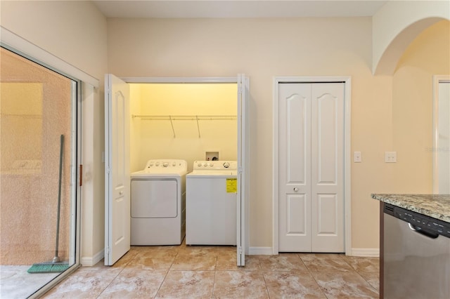 washroom with washer and clothes dryer