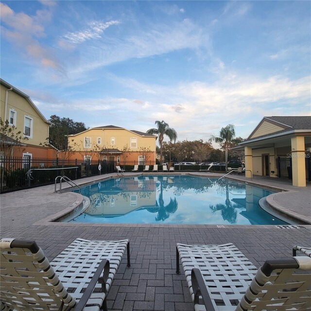 view of swimming pool featuring a patio