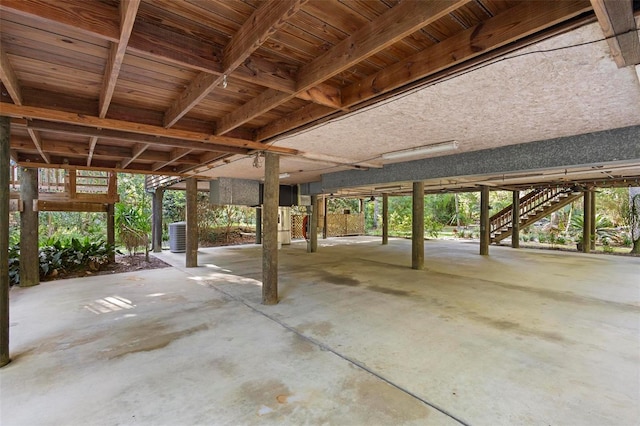 view of patio with central AC and stairs