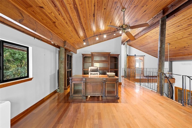 unfurnished office with ceiling fan, wooden ceiling, vaulted ceiling, and wood finished floors