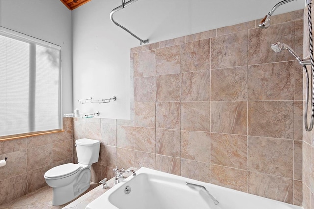 bathroom featuring a washtub, a shower, toilet, and tile walls