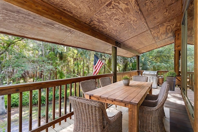 wooden deck featuring grilling area