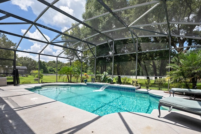 view of swimming pool with a patio and glass enclosure