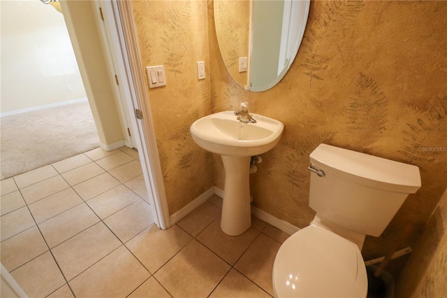 bathroom featuring tile patterned floors and toilet