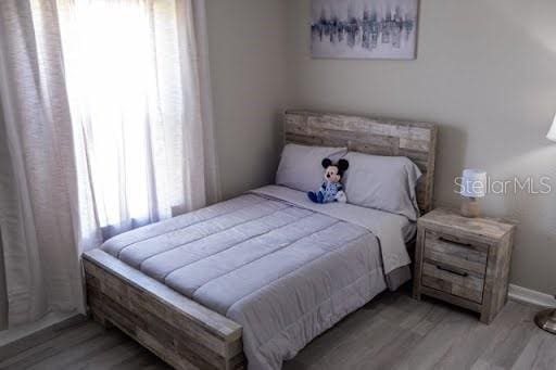 bedroom featuring light hardwood / wood-style flooring