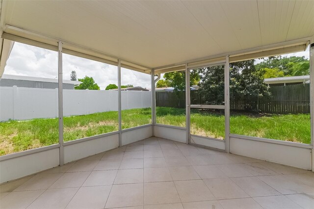 unfurnished sunroom with a healthy amount of sunlight