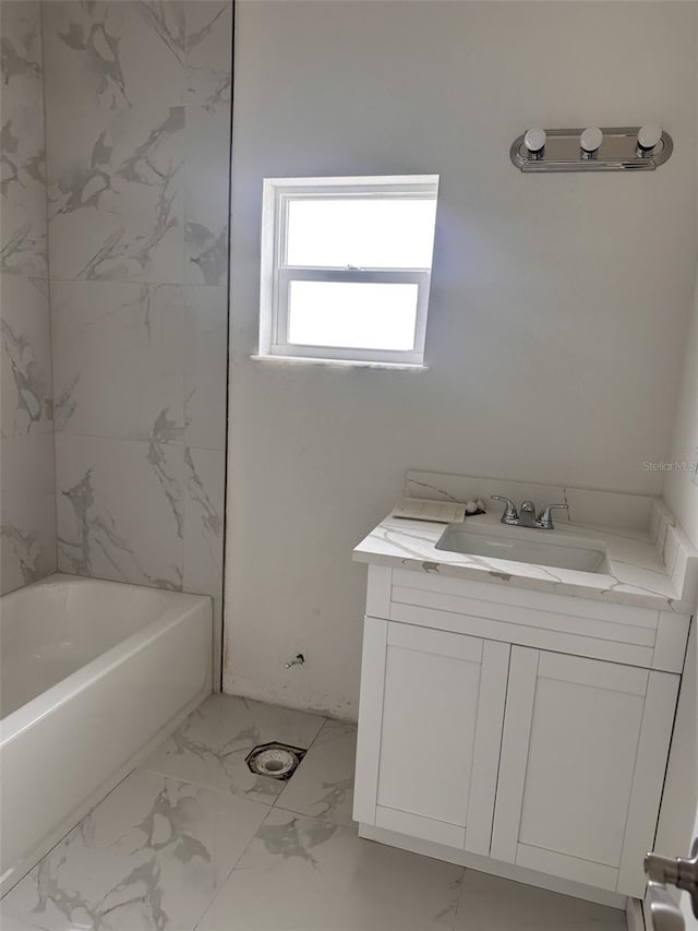 bathroom featuring vanity and shower with separate bathtub