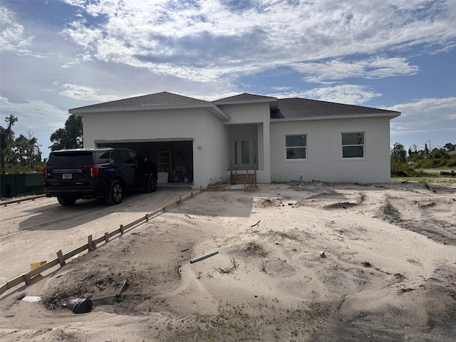 view of front of house with a garage