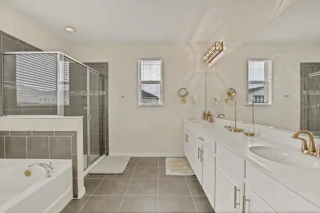 bathroom with shower with separate bathtub, dual vanity, and tile patterned floors