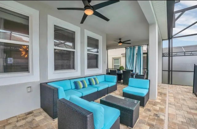 view of patio / terrace featuring an outdoor living space and ceiling fan