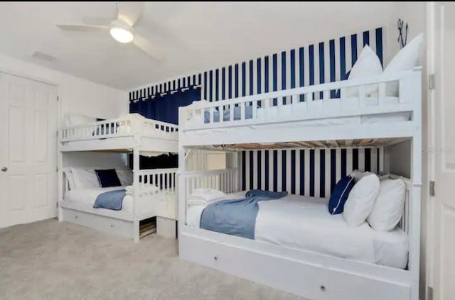 bedroom featuring carpet and ceiling fan