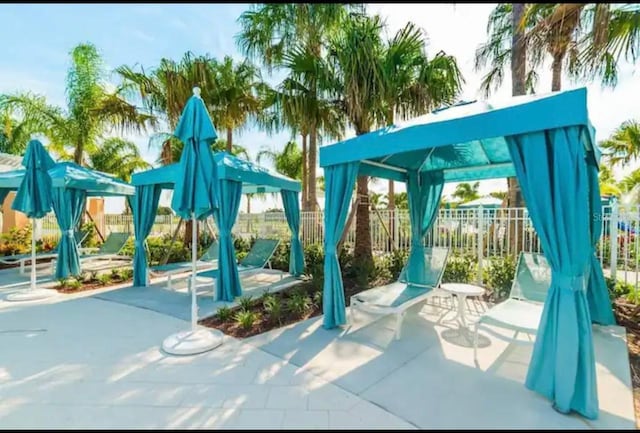 view of play area with a patio and a gazebo