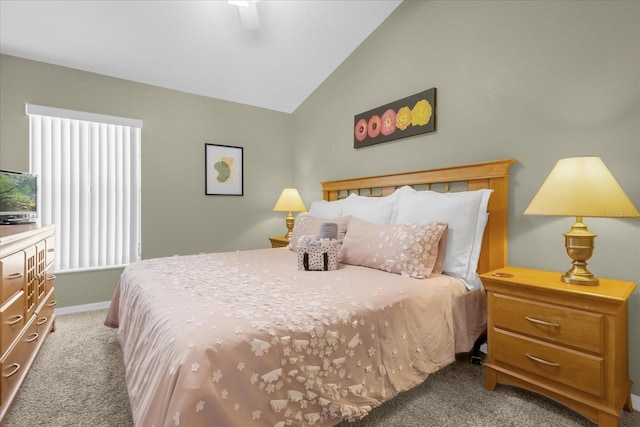 bedroom featuring ceiling fan, light colored carpet, and lofted ceiling