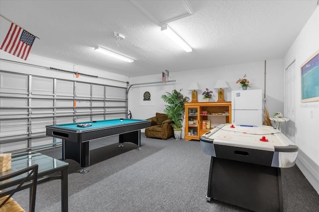 recreation room featuring a textured ceiling and billiards