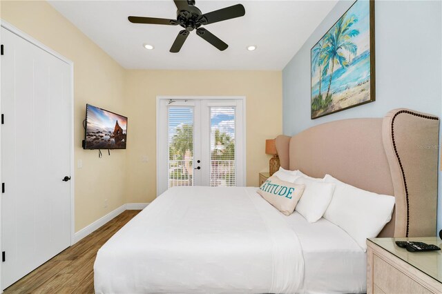 bedroom with ceiling fan, french doors, hardwood / wood-style floors, and access to outside