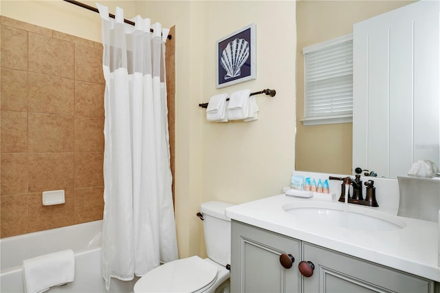 full bathroom featuring toilet, shower / tub combo, and vanity