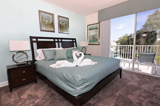 bedroom featuring access to exterior, baseboards, and carpet flooring