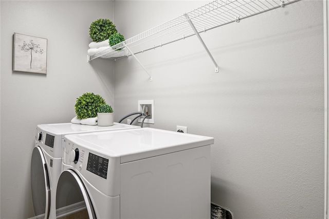 washroom featuring separate washer and dryer