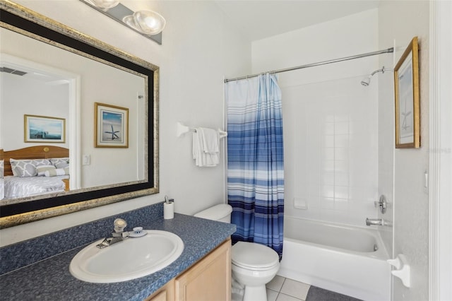 full bathroom with vanity, tile patterned floors, toilet, and shower / tub combo with curtain