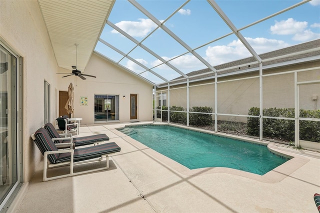 pool featuring a lanai, ceiling fan, and a patio