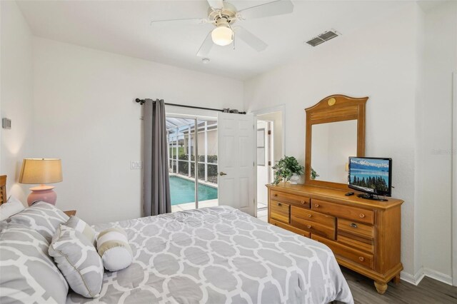 bedroom with a ceiling fan, access to outside, visible vents, and wood finished floors