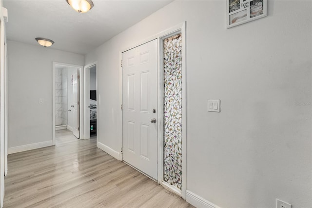 foyer entrance featuring light hardwood / wood-style flooring