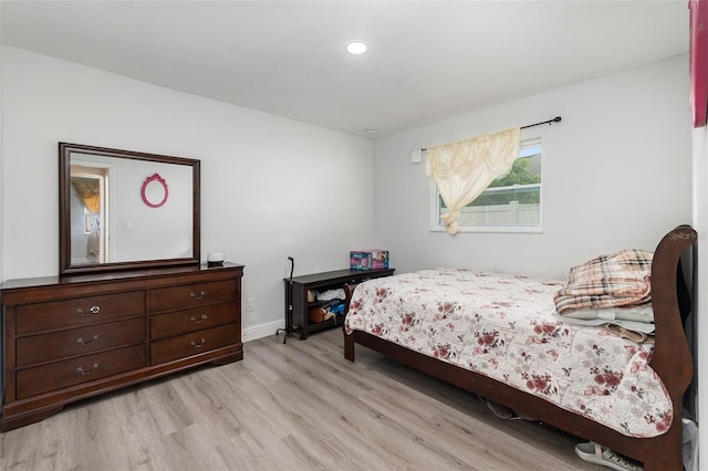 bedroom with light hardwood / wood-style flooring