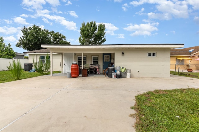 back of property featuring central air condition unit