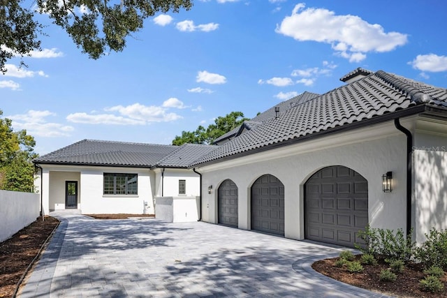 view of front of home featuring a garage