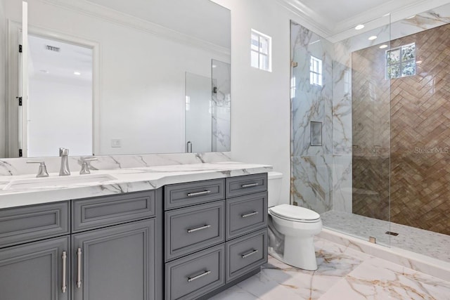 bathroom with crown molding, vanity, a shower with shower door, and toilet