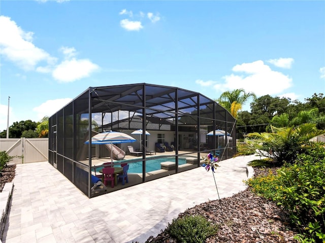 view of swimming pool with a patio