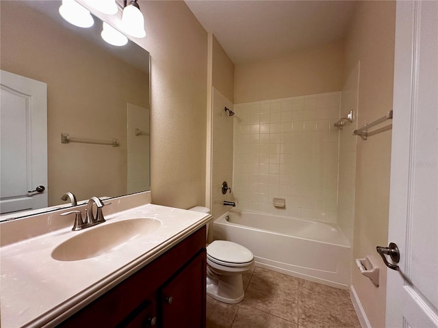 full bathroom featuring vanity, toilet, tiled shower / bath combo, and tile patterned flooring