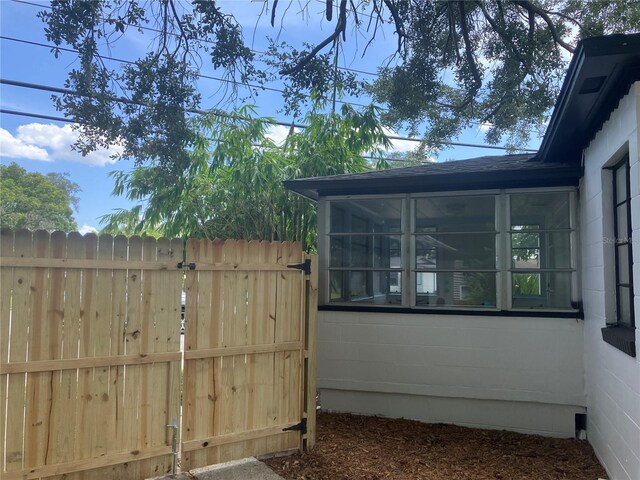 view of home's exterior featuring a sunroom