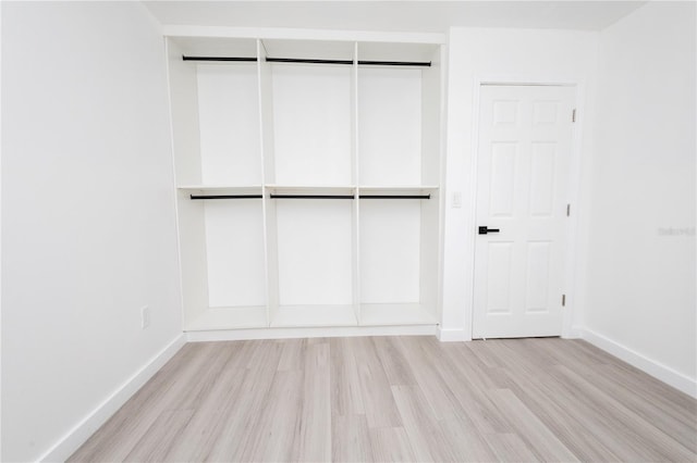 interior space featuring light hardwood / wood-style flooring and a closet