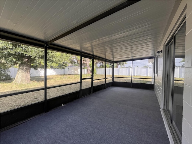 unfurnished sunroom featuring a healthy amount of sunlight