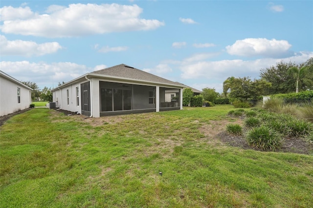 view of yard with a sunroom