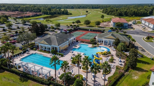 bird's eye view with a water view