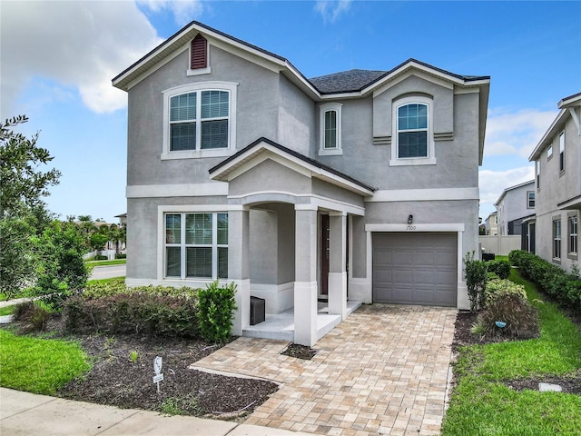 front of property featuring a garage