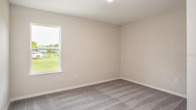 view of carpeted spare room