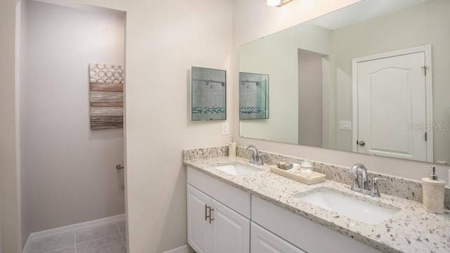 3911 Gardenia Dr, Indian Lake Estates, FL 33855 - bathroom with double vanity, tile patterned flooring, baseboards, and curtained shower