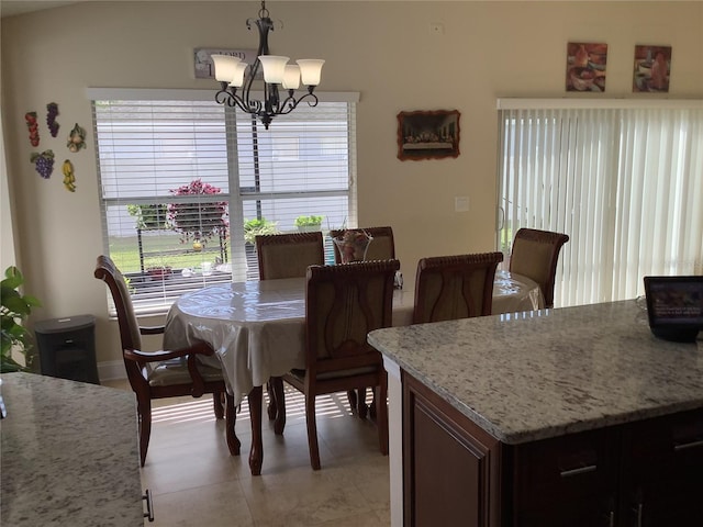 dining area with a chandelier