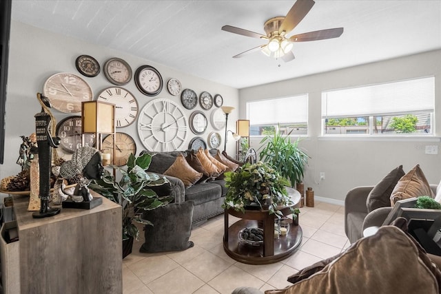 tiled living room featuring ceiling fan