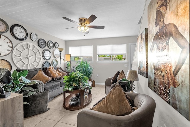 tiled living room featuring ceiling fan