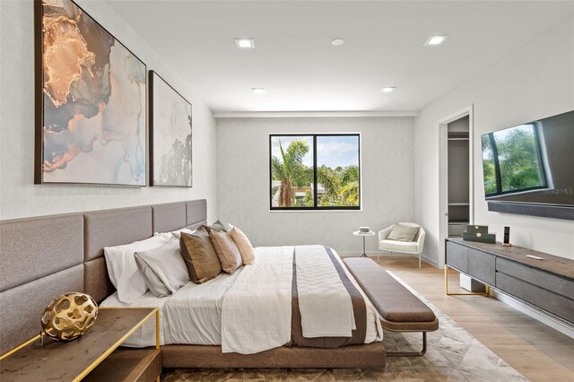 bedroom with wood-type flooring