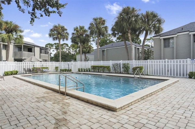 view of pool featuring a patio area