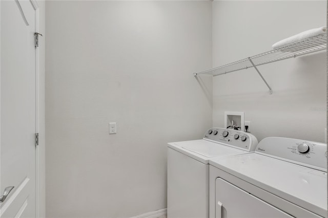 laundry area with laundry area and independent washer and dryer